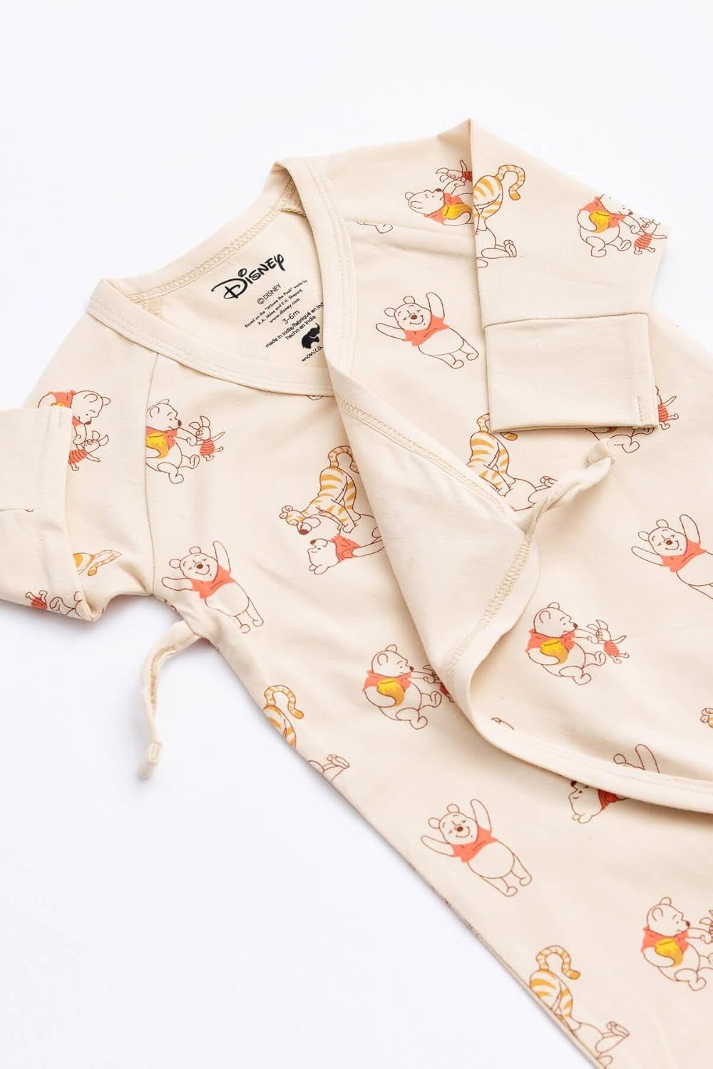 Flat lay of Organic Baby Kimono Tie One-Piece Bodysuit