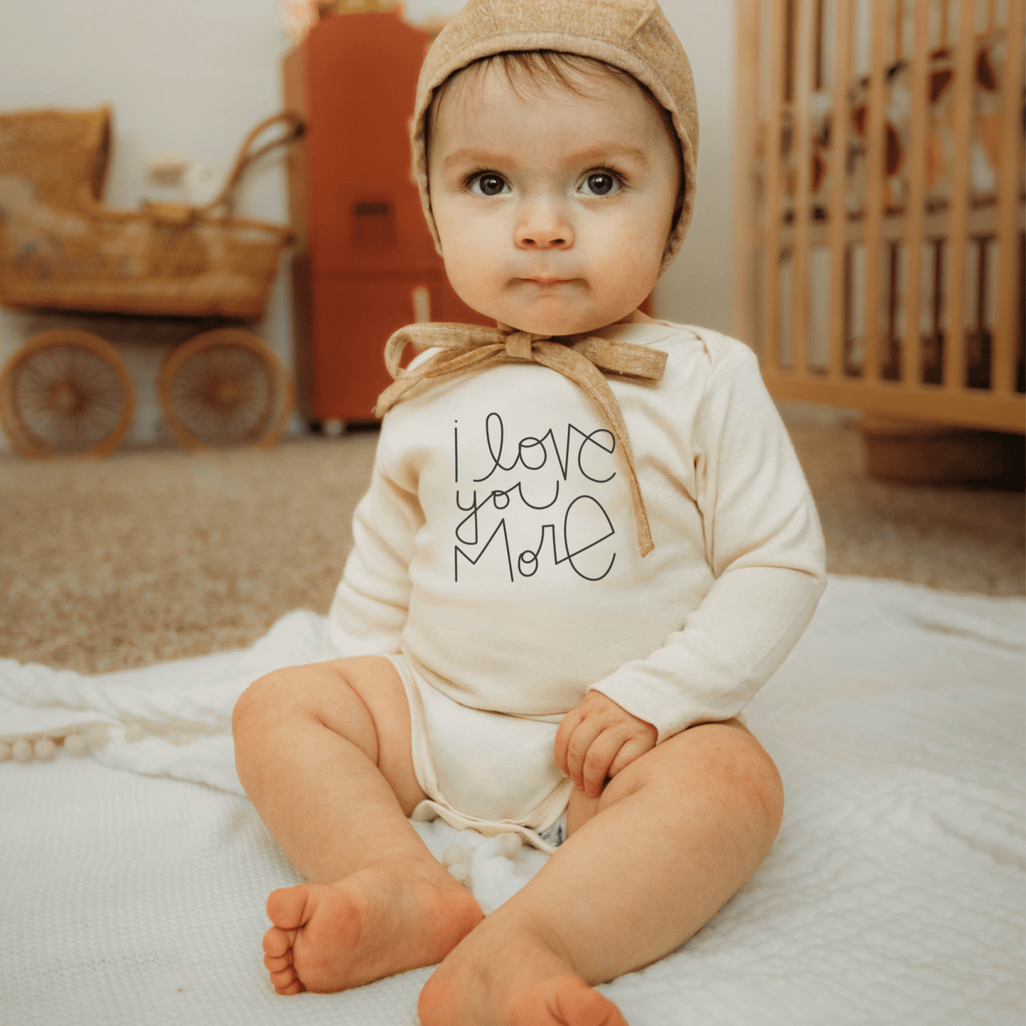 I Love You More Baby Bodysuit cute baby love themed long sleeve bodysuit