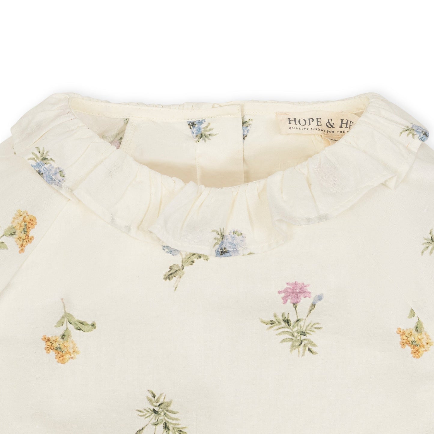 Close-up of the ruffle collar on the Organic Ruffle Collar Top
