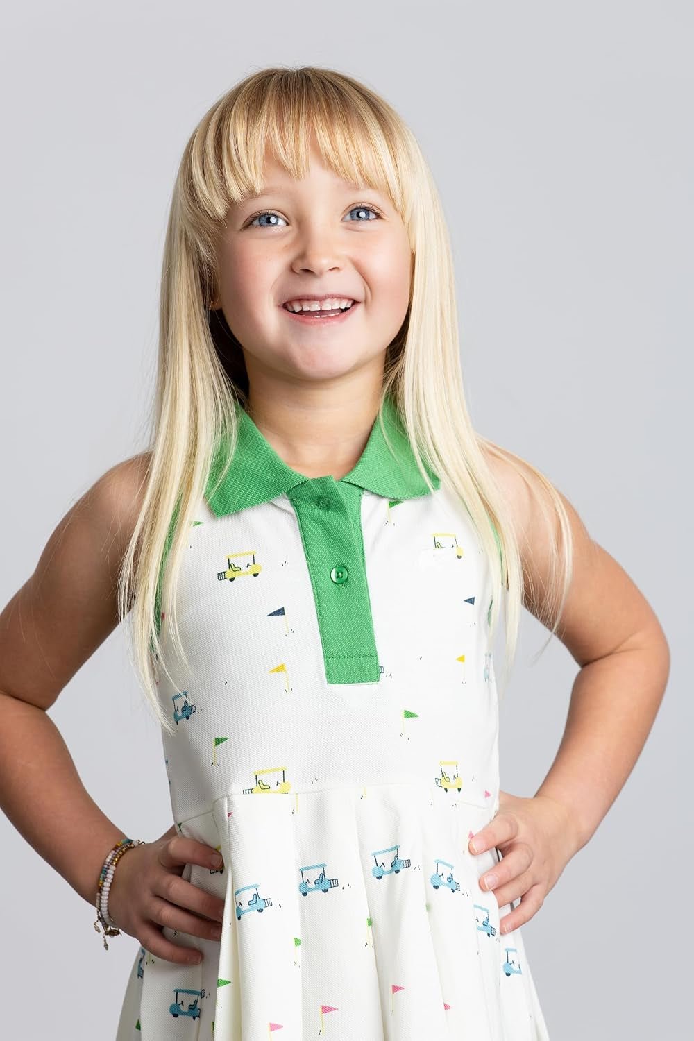 Girl wearing Organic Cotton Pleated Tennis Dress